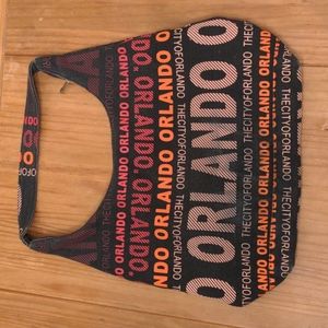 Robin Ruth Large Charcoal, Red, Orange, and Tan Orlando Hobo Bag